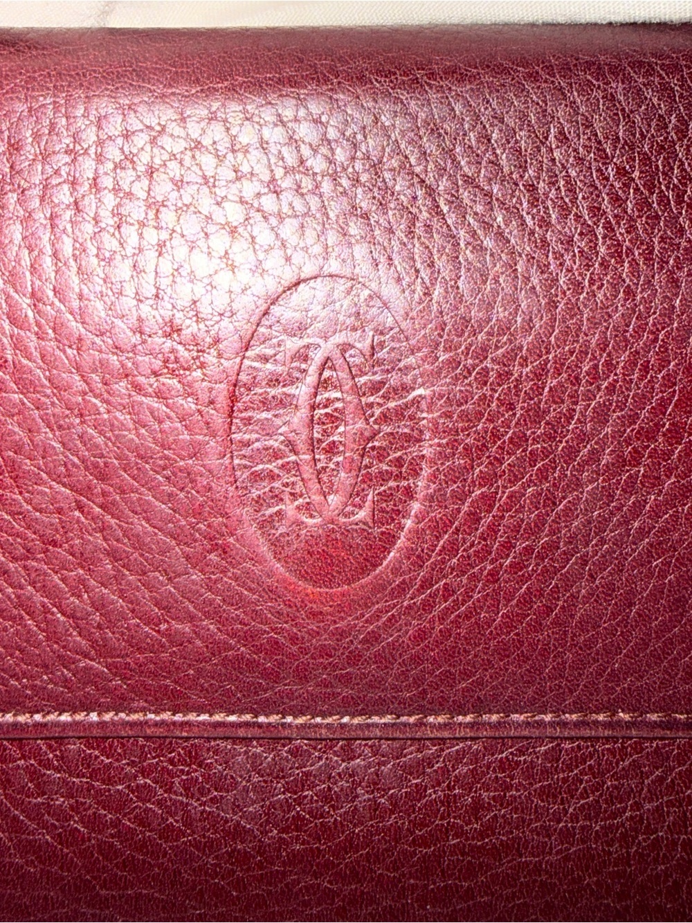 Cartier Must Line leather wallet, featuring an embossed Double C pristine cond!